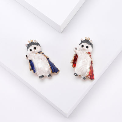 enamel crowned cat in cape brooch group view