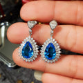 Blue Teardrop Halo Stone Drop Earrings in Silver Tone view 4