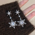 Silver Crystal Snowflake Drop Earrings with Double Starbursts view 1