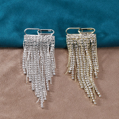A rectangular bar releasing graduated crystal chain fringe shown on a white background.