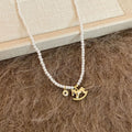 White Pearl Look Necklace with Gold Tone Horse Pendant view 6