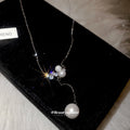 Silver Geometric Pearl Drop Necklace With A Silver-Tone Finish view 2
