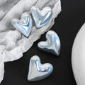 Puffy Heart Stud Earrings Iridescent Silver Steel Finish view 3