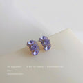 Gold Tone Purple Triple Oval Faceted Stone Half Hoop Earrings view 3