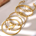 Heart Crystal and Geometric Bangle Collection in Two Metal Tones view 3