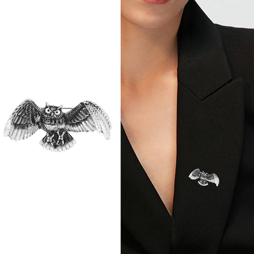 Silver owl brooch product shot and worn on black blazer lapel