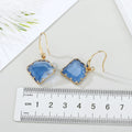 Gold Tone Irregular Faceted Glass Drop Earrings in Six Colors view 2