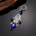 Silver Tone Hamsa Glass Eye and Horseshoe Evil Eye Keychains view 2