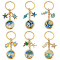 Starfish, Conch and Shell Charm Keychains Featuring Blue Conch Across 69 Variations view 1