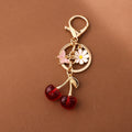 Cherry Charm Keychain with Enamel Butterfly and Daisy Flower Pendant view 6