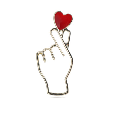 Gold finger heart hand gesture brooch with red enamel heart