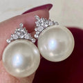 Silver Tone Crown Pearl Stud Earrings Clear Pavé Top view 2