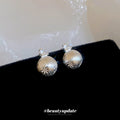 Textured Round Ball Stud Earrings With Snowflake Crystal Tops view 2