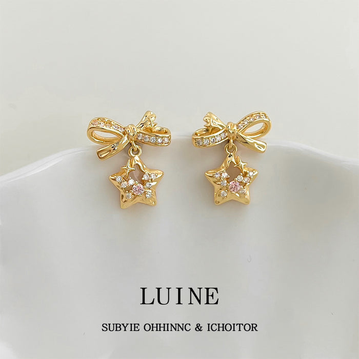 Gold Tone Clear Stone Bow And Star Drop Stud Earrings