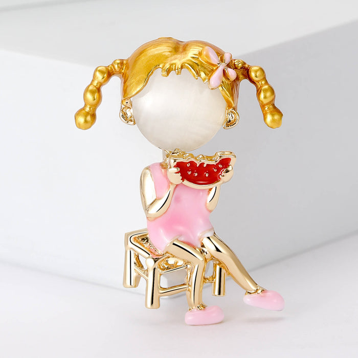 Enamel Girl on Chair Brooch With Pink Dress And Gold Tone Hair