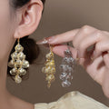 Gold and Silver Cascading Shell Leverback Earrings view 1