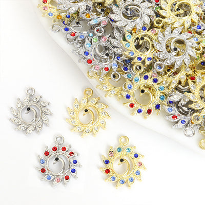 Front assortment of round peacock forms with curled necks and crystal fan tails