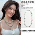 Green Cord Necklace With Pink and Purple Round Beads view 1