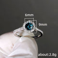 Round Solitaire Halo Slim Ring In Four Stone Colors Silver Tone view 5