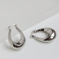 Polished Teardrop Hoop Earrings in Gold and Silver view 3
