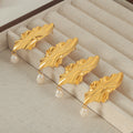 Gold Steel Wavy Leaf Drop Earrings With Pearl Dangles view 4