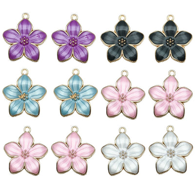 Colorful cherry blossom charms arranged on a light background