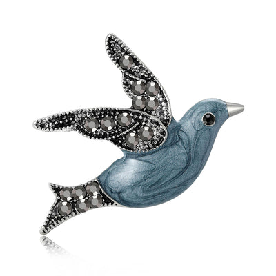 Blue grey enamel dove brooch flying pose front