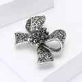 Dark Crystal Bow Brooch With Textured Ribbon Loops view 2