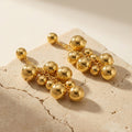 Graduated Metal Ball Cluster Drop Earrings in Polished Gold Tone view 1
