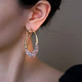 Clear Resin Teardrop Earrings with Hammered Gold Tone Hoops view 4