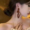 Brown Resin Geometric Ring Drop Earrings with Square Studs view 4