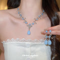 Silver Light Blue Resin Flower Teardrop Necklace Earrings Set view 3