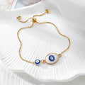 Gold Tone Blue Evil Eye Double-Dangle Slider Bracelets in Eight Designs view 3
