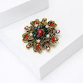 Antique Gold Openwork Floral Brooch Red Green Crystals view 3