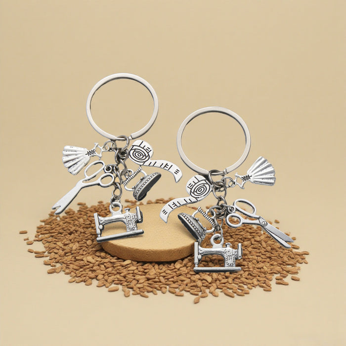 Silver Tone Sewing Machine Scissors Tape and Dress Keychain