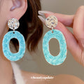 Textured Open Oval Resin Drop Earrings in White and Blue view 3