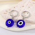 Silver Tone Blue Glass Evil Eye Huggie Drop Earrings view 3