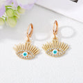 Gold and Silver Tone Crystal Lash Evil Eye Huggie Earrings view 6