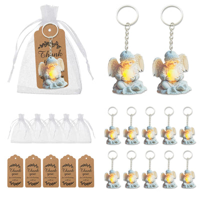 White organza bags, thank-you tags, and angel keychains arranged as single pieces and packaged sets.