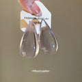Clear Teardrop Stud Earrings With Smooth Transparent Finish view 4
