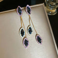 Purple Crystal Triple Teardrop Earrings with Gold Tone Hooks view 1