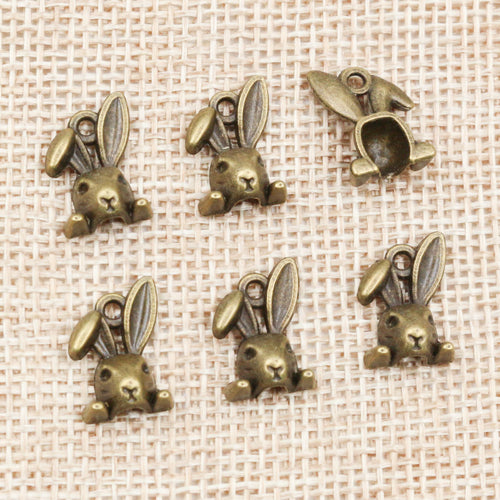 small sitting rabbit charms shown in a close detail view