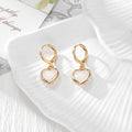 Gold Tone Crystal Heart Huggie Earrings in Seven Color Options view 5