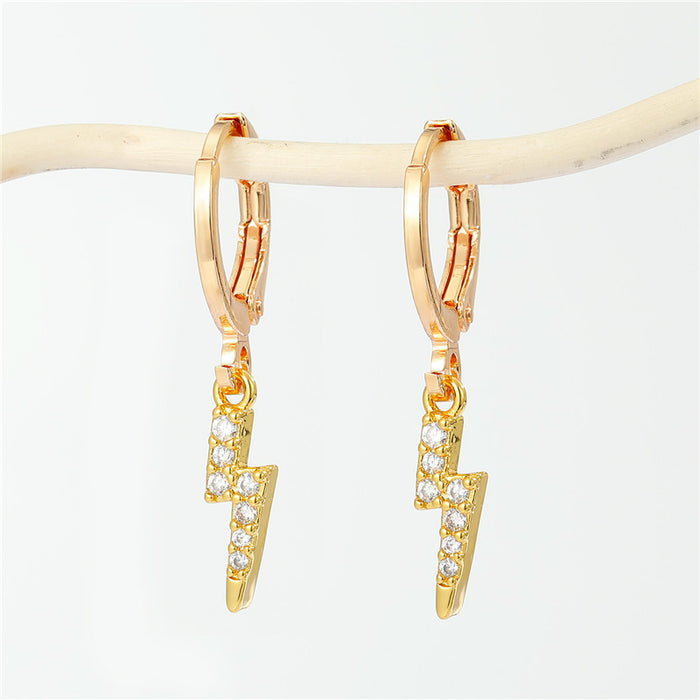 Gold Tone Huggie Earrings with Six Small Symbolic Drop Charms