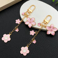 Pink and Blue Blossom Butterfly Metal Clasp Keychain Pair view 3