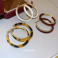 Two Tone Oval Hoop Earrings With Crystal Trim and Colored Inlays view 3