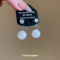 Clear Crystal Stud Earrings With White Pearl Drops view 1
