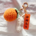 Crocheted Fruit Keychain Set with Bells and Gold Tone Hardware view 2