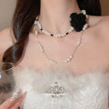 Layered Pearl Necklace with Black Fabric Flower Accent view 1