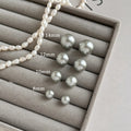 Gray Pearl Round Stud Earrings in Four Sizes With Metal Details view 1